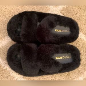 Black fuzzy slippers